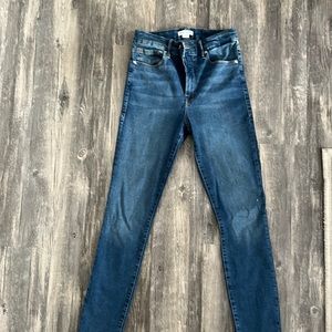 Good American Raw hem skinny jeans.